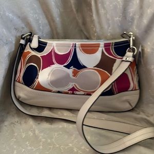 Coach multi color cross body purse